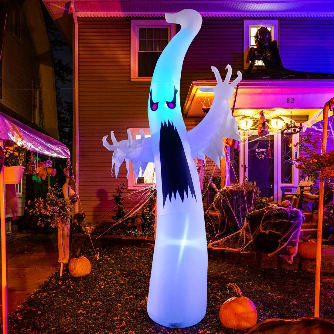 Halloween inflatable ghost with red eyes and colorful LEDs
