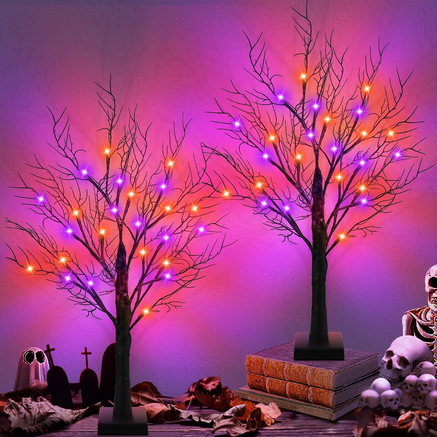 Set of two 24 inch black Halloween tabletop trees with orange and purple LEDs