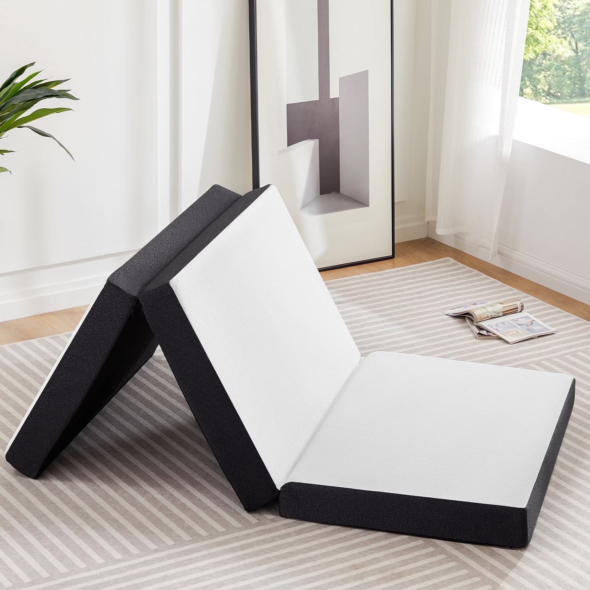 Tri-fold gel memory foam mattress unfolded flat as a floor bed