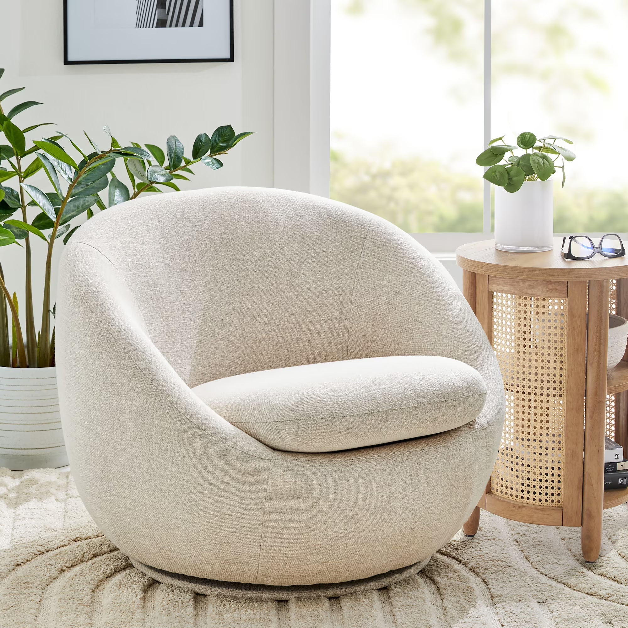 Upholstered accent chair with round arms and wood legs